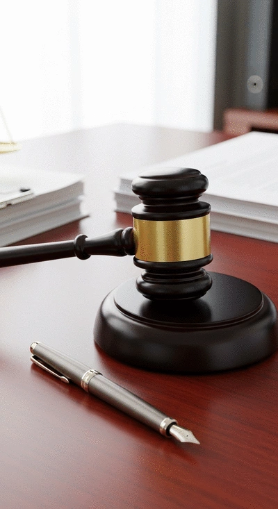 Gavel and legal documents on a desk, symbolizing legal action for housing disrepair